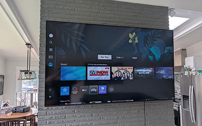 Large screen TV mounting on hard surface