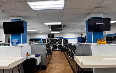 B2B TVs mounted in an office.