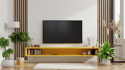 Media shelf installed below a wall-mounted TV with streaming devices