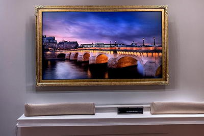 Samsung Frame TV flush-mounted on a living room wall displaying artwork — professional Frame TV installation